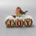 Christmas robin sitting on snow covered logs with Joy 9cm