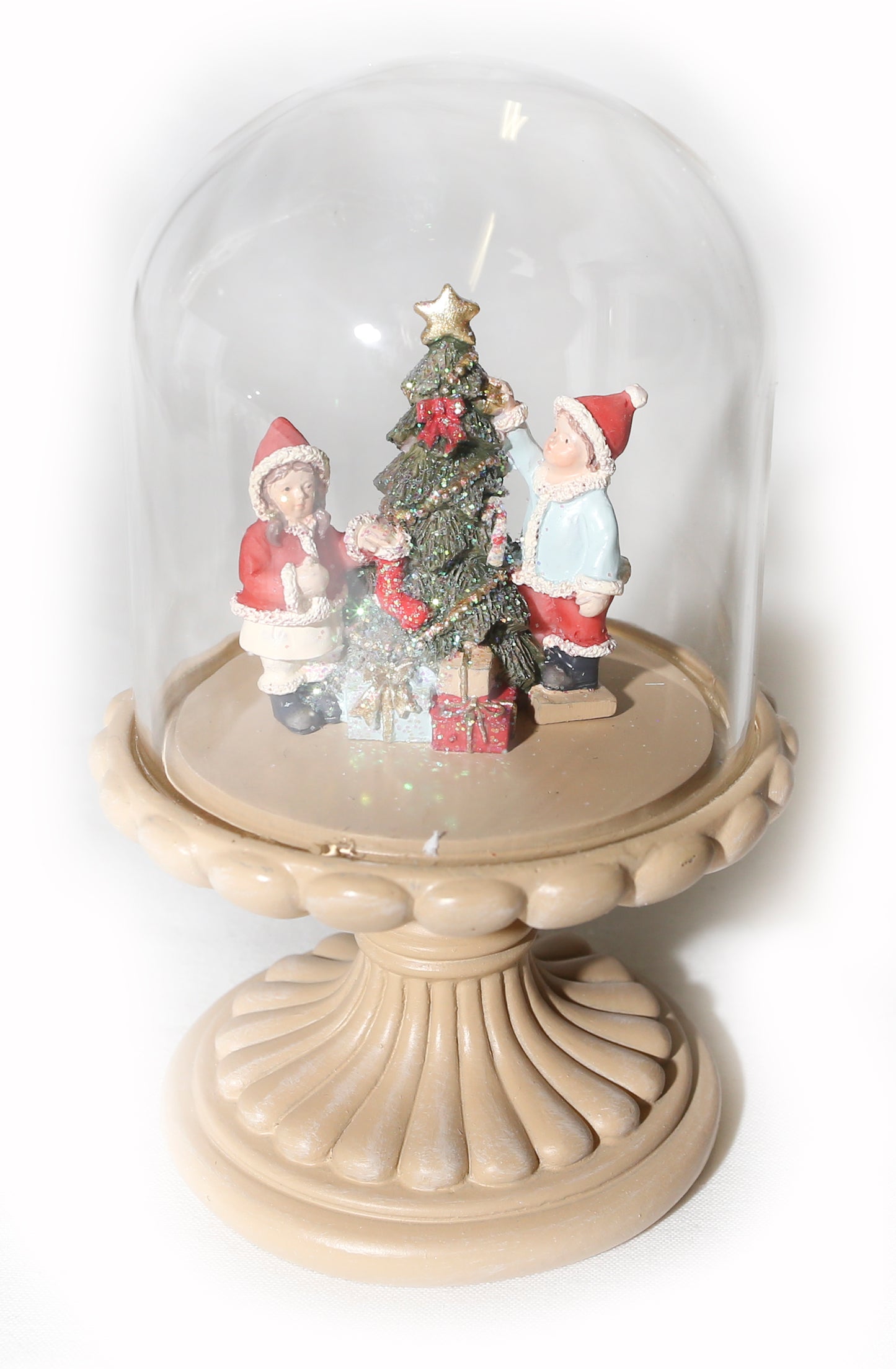 Christmas scene ornament in glass dome on stand
