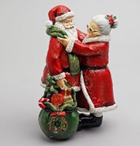 Mrs Santa placing Santas Scarf on him 16cm